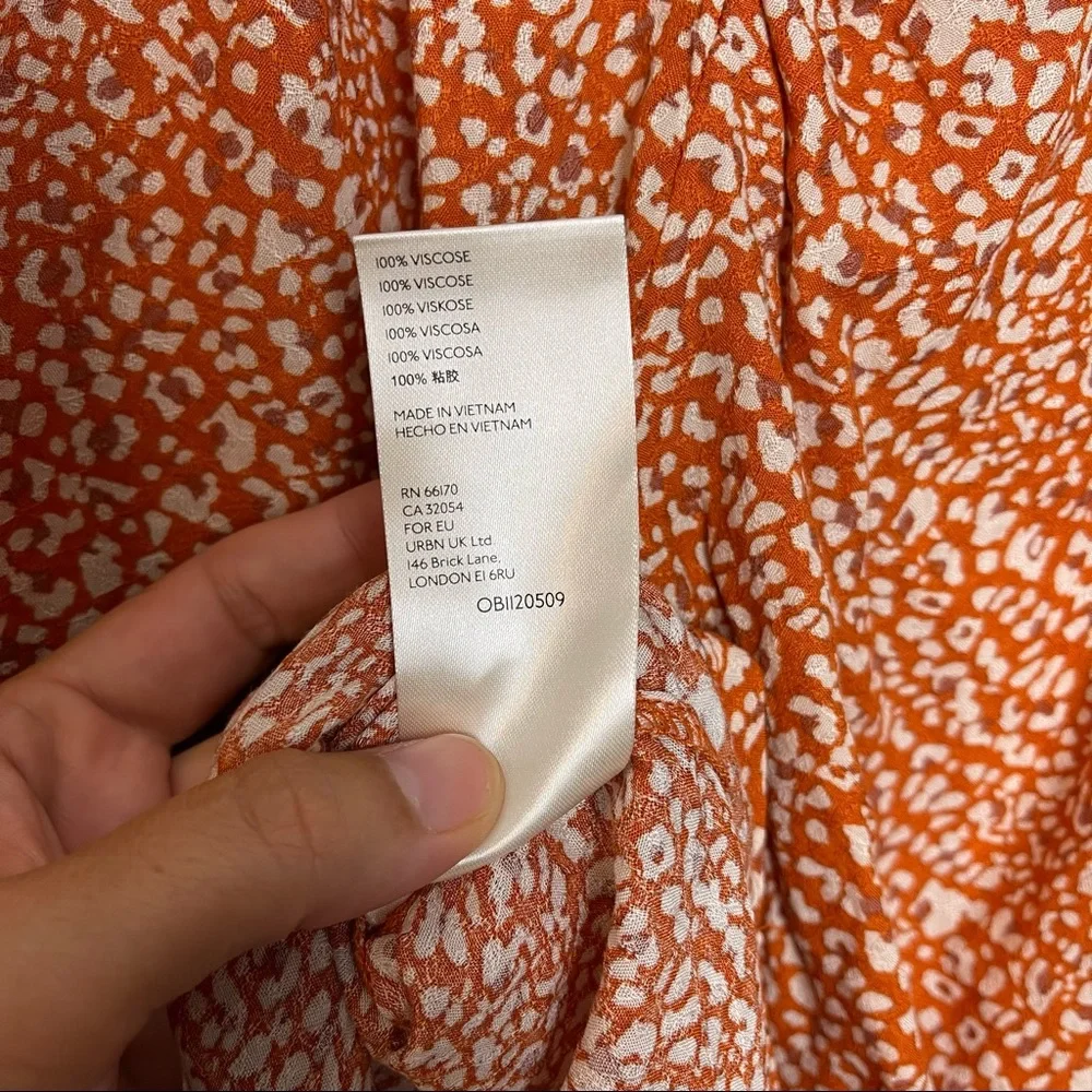 NWT FREE PEOPLE- Celia Printer Short Sleeve Blouse Rust Combo